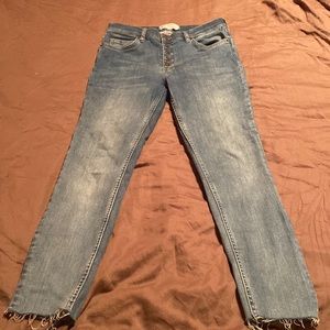 Free people cropped/ankle cut jeans.